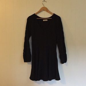 Black v- neck dress.